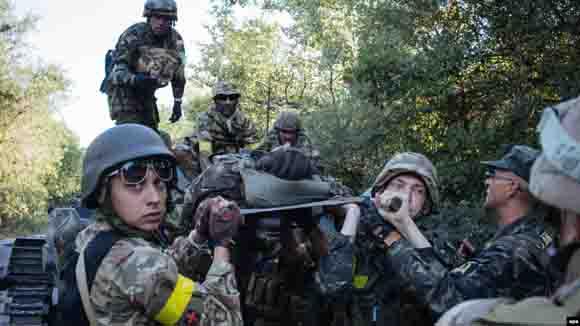Стаття Доклад ООН: Украинских военных под Иловайском убивали русские военные Ранкове місто. Крим