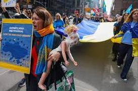 Стаття Спасите детей Украины! В городах мира прошли массовые марши (фото) Ранкове місто. Крим